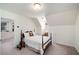 Cozy bedroom with a bed, window nook, and access to the kitchen at 978 Moores Club Ne, Atlanta, GA 30319