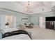 Spacious main bedroom with sitting area, doors to ensuite, and large windows for ample natural light at 978 Moores Club Ne, Atlanta, GA 30319