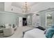 Relaxing main bedroom with a sitting area, ensuite, and an abundance of natural light at 978 Moores Club Ne, Atlanta, GA 30319