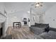 Open-concept living and dining area featuring modern decor, flooring, and ample natural light at 300 Lakeside Dr, Covington, GA 30016