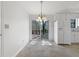 Cozy dining area with a sliding door to deck; bright and airy with tile flooring at 31 Fox Creek Ct, Dallas, GA 30157