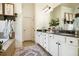 Bright bathroom showcasing dual sinks, a large mirror, and neutral decor at 3227 Aviary Nw Ct, Acworth, GA 30101