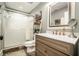 Bathroom featuring a glass enclosed shower, vanity with mirror, and a ladder shelf at 3227 Aviary Nw Ct, Acworth, GA 30101