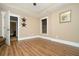 Bright bedroom with hardwood floors, neutral walls, and large window with natural light at 3227 Aviary Nw Ct, Acworth, GA 30101