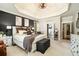 Inviting main bedroom features tray ceiling and doorway to main bathroom at 3227 Aviary Nw Ct, Acworth, GA 30101