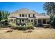 View of the back of the house featuring a patio, outdoor seating, pergola, and screened-in porch at 3227 Aviary Nw Ct, Acworth, GA 30101