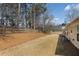 Large grassy backyard with wooden fence at 4927 Magnolia Cottage Way, Acworth, GA 30101