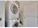 Convenient laundry room with stacked washer and dryer at 4927 Magnolia Cottage Way, Acworth, GA 30101