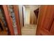 Partially finished attic with wooden framing, insulation, and a doorway leading to another room at 993 Castle Falls Dr. Ne Dr, Atlanta, GA 30329