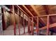 Partially finished attic space with exposed wooden beams and insulation, ready for customization at 993 Castle Falls Dr. Ne Dr, Atlanta, GA 30329