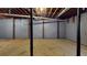 Unfinished basement featuring concrete floor and support beams at 993 Castle Falls Dr. Ne Dr, Atlanta, GA 30329