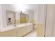 Bathroom featuring a double sink vanity and a mirror that stretches the length of the counter at 993 Castle Falls Dr. Ne Dr, Atlanta, GA 30329