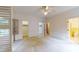 Large bedroom with an ensuite bathroom and closet featuring neutral colored walls and carpet at 993 Castle Falls Dr. Ne Dr, Atlanta, GA 30329