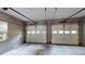 Well-lit two car garage featuring automatic doors and ample room for parking and storage at 993 Castle Falls Dr. Ne Dr, Atlanta, GA 30329