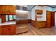 Bright kitchen featuring stainless steel appliances and wood cabinets at 993 Castle Falls Dr. Ne Dr, Atlanta, GA 30329
