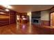 Large living space featuring hardwood floors, fireplace, wall of shelves, and lots of natural light at 993 Castle Falls Dr. Ne Dr, Atlanta, GA 30329
