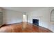Bright, spacious living room featuring hardwood floors, fireplace, and natural light at 993 Castle Falls Dr. Ne Dr, Atlanta, GA 30329