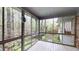 Inviting screened porch offering peaceful views of the surrounding greenery at 993 Castle Falls Dr. Ne Dr, Atlanta, GA 30329