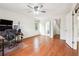 Spacious bedroom with hardwood floors and a view into the attached bathroom at 108 Kirk Crossing Dr, Decatur, GA 30030