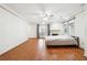 Bright bedroom with hardwood floors, a fireplace, and many windows at 108 Kirk Crossing Dr, Decatur, GA 30030