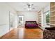 Bedroom with hardwood floors, natural light, and built-in bookshelves at 108 Kirk Crossing Dr, Decatur, GA 30030