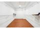 Spacious walk-in closet with hardwood floors and wire shelving at 108 Kirk Crossing Dr, Decatur, GA 30030