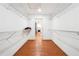 Spacious walk-in closet with hardwood floors, white walls, and wire shelving at 108 Kirk Crossing Dr, Decatur, GA 30030