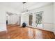 Charming dining room includes hardwood floors, modern lighting, and large windows at 108 Kirk Crossing Dr, Decatur, GA 30030