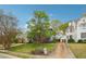 Home with mature trees, a well-maintained lawn, and view of other houses in neighborhood at 108 Kirk Crossing Dr, Decatur, GA 30030