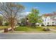 Inviting home with mature trees, a well-maintained lawn, and a classic brick facade at 108 Kirk Crossing Dr, Decatur, GA 30030
