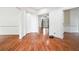 Bright living room showcasing hardwood floors and an open layout with views to other rooms at 108 Kirk Crossing Dr, Decatur, GA 30030