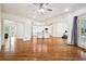 Spacious open concept living room featuring hardwood floors connecting living, dining, and kitchen areas at 108 Kirk Crossing Dr, Decatur, GA 30030