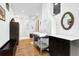 Modern bathroom with double sink vanity, walk-in shower, and hardwood floors, offering a luxurious spa-like experience at 132 Lakeshore Dr, Roswell, GA 30075