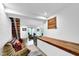 Cozy living room area with exposed stairs, comfortable seating, and natural light at 132 Lakeshore Dr, Roswell, GA 30075