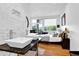 Bright main bedroom with natural light, sleek dual sinks, and ensuite bathroom at 132 Lakeshore Dr, Roswell, GA 30075