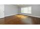Bedroom with hardwood floors, neutral paint and natural light at 207 Bridge Se Ln, Smyrna, GA 30082