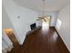 Spacious living room featuring a fireplace, ceiling fan, and sliding glass doors to the outside at 207 Bridge Se Ln, Smyrna, GA 30082