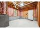Unfinished basement space with concrete floor and insulated walls ready for customization at 21 Enclave Walk, Powder Springs, GA 30127