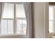 Bright windows with view, complemented by soft curtains, illuminating the room with natural light and modern blinds at 308 Overture Ct, Smyrna, GA 30080