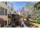 Large backyard with a tiered deck and beautiful landscaping at 3285 Millwood Se Trl, Smyrna, GA 30080
