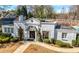 Charming community clubhouse with a classic design, featuring a brick exterior, manicured landscaping, and inviting entryway at 3285 Millwood Se Trl, Smyrna, GA 30080