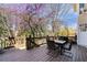 Spacious outdoor deck with a dining table and chairs, perfect for entertaining and relaxation at 3285 Millwood Se Trl, Smyrna, GA 30080