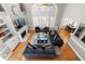 Open living area with vaulted ceilings, fireplace, and bright views at 3285 Millwood Se Trl, Smyrna, GA 30080