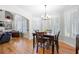Bright living room with hardwood floors, fireplace, and view to the backyard at 3285 Millwood Se Trl, Smyrna, GA 30080