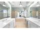 Bright and spacious main bathroom with double vanities and a soaking tub at 3285 Millwood Se Trl, Smyrna, GA 30080