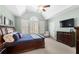 Vaulted ceiling main bedroom with plush carpet and a full ensuite at 3285 Millwood Se Trl, Smyrna, GA 30080