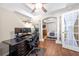 Bright home office space with a tray ceiling and an open doorway to the bedroom at 3285 Millwood Se Trl, Smyrna, GA 30080