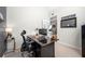 Comfortable office space with dark desk, neutral walls, and overhead lighting at 3285 Millwood Se Trl, Smyrna, GA 30080