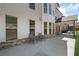 Backyard featuring a patio with seating and an expansive view of the surrounding greenery at 11620 Crestview Ter, Johns Creek, GA 30024