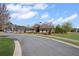 Community clubhouse set amidst lush landscaping, offering recreational amenities for residents at 11620 Crestview Ter, Johns Creek, GA 30024